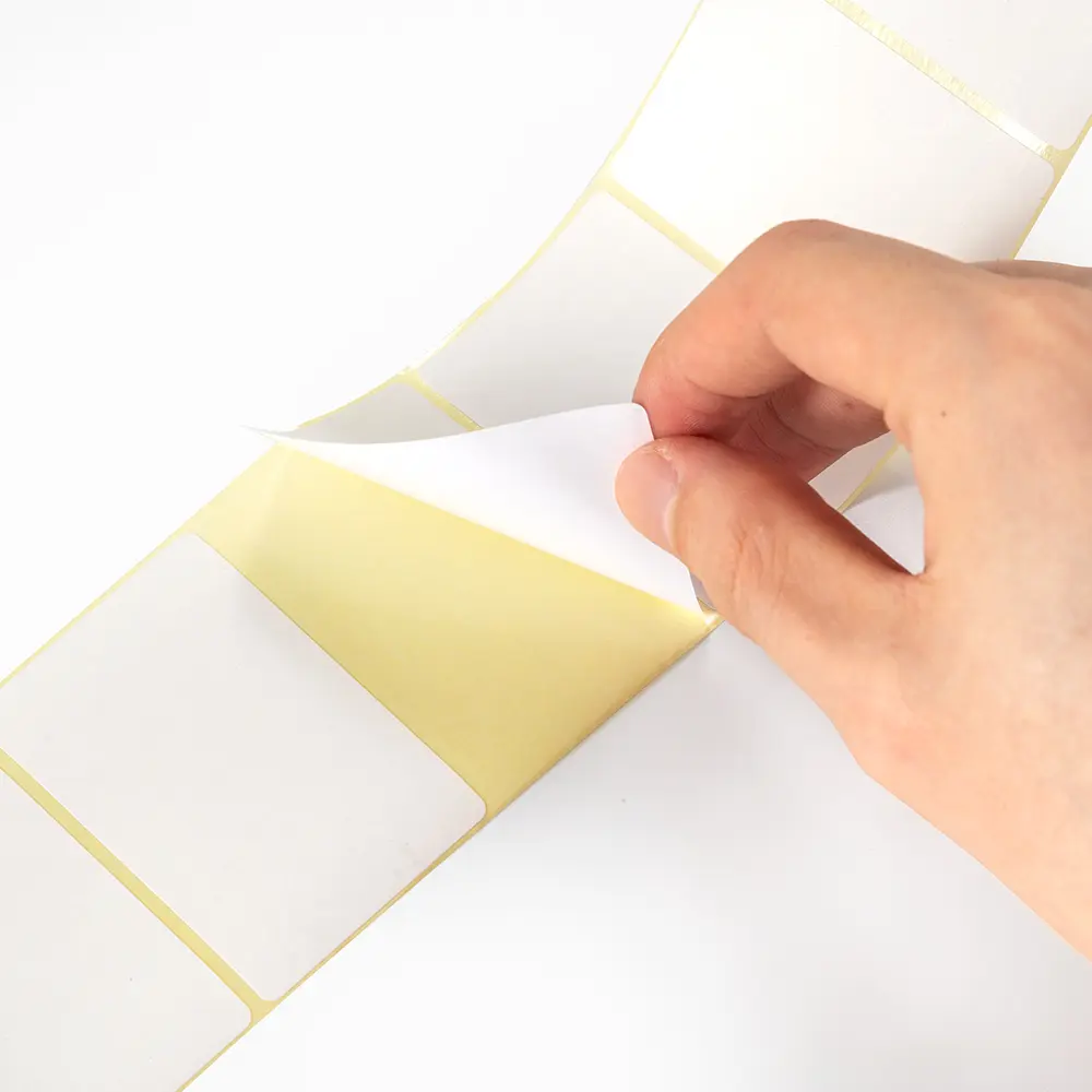 Papier thermique POS 65 g/m&sup2; + adh&eacute;sif thermofusible antigel + papier antiadh&eacute;sif glassine jaune 50 g/m&sup2;